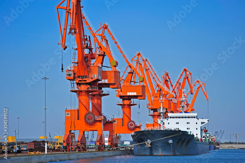 Wallpaper Mural Port crane bridge and bulk carrier Torontodigital.ca