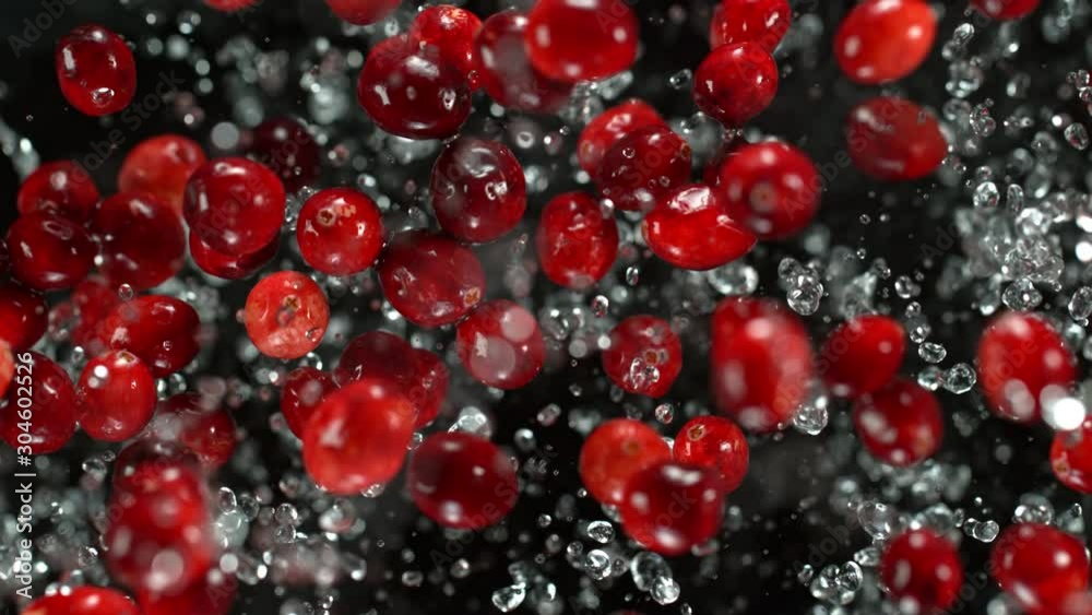 Super Slow Motion Shot of Cranberries and Water Explosion Towards Camera at 1000fps. Super Slow Motion Shot of Cranberries and Water Explosion Towards Camera at 1000fps.