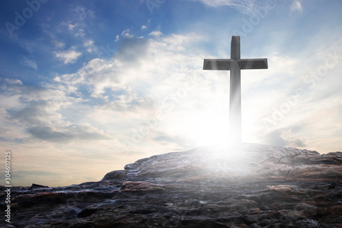 Photography cross the crucifixion on the mountain jesus christ with a sunset background