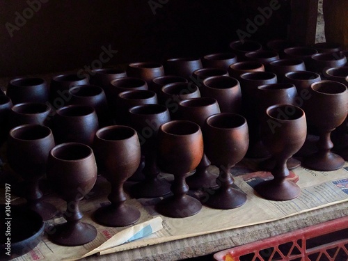 Handicrafts of clay from Pomaire, Chile. Cups made with modeling clay photo