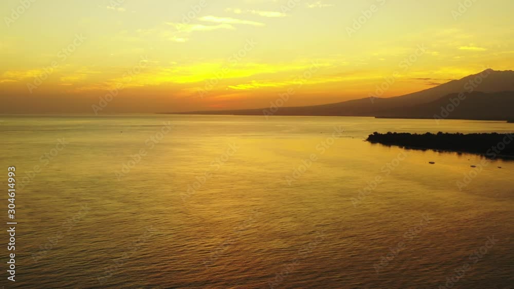 majestic golden sunset , tropical sea with islands, orange horizon, motion background, Bahamas majestic golden sunset , tropical sea with islands, orange horizon, motion background, Bahamas