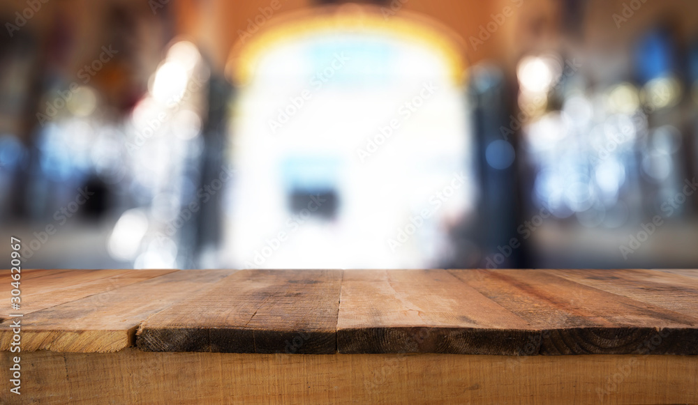 empty rustic wooden table with interior background