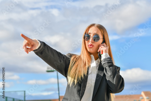 Business woman talking on phone