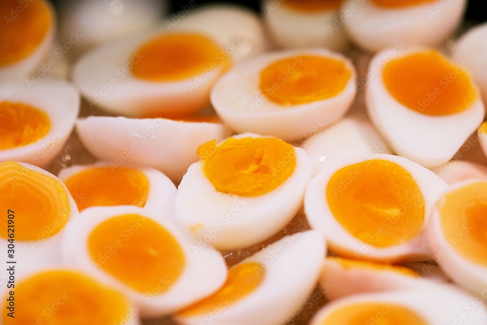 Hard boiled chicken egg cut in half at thai street food market Hard boiled chicken egg cut in half at thai street food market
