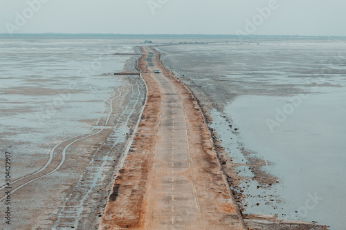 View of the road at White Rann of Kutch in Kutch, Gujarat, India photo