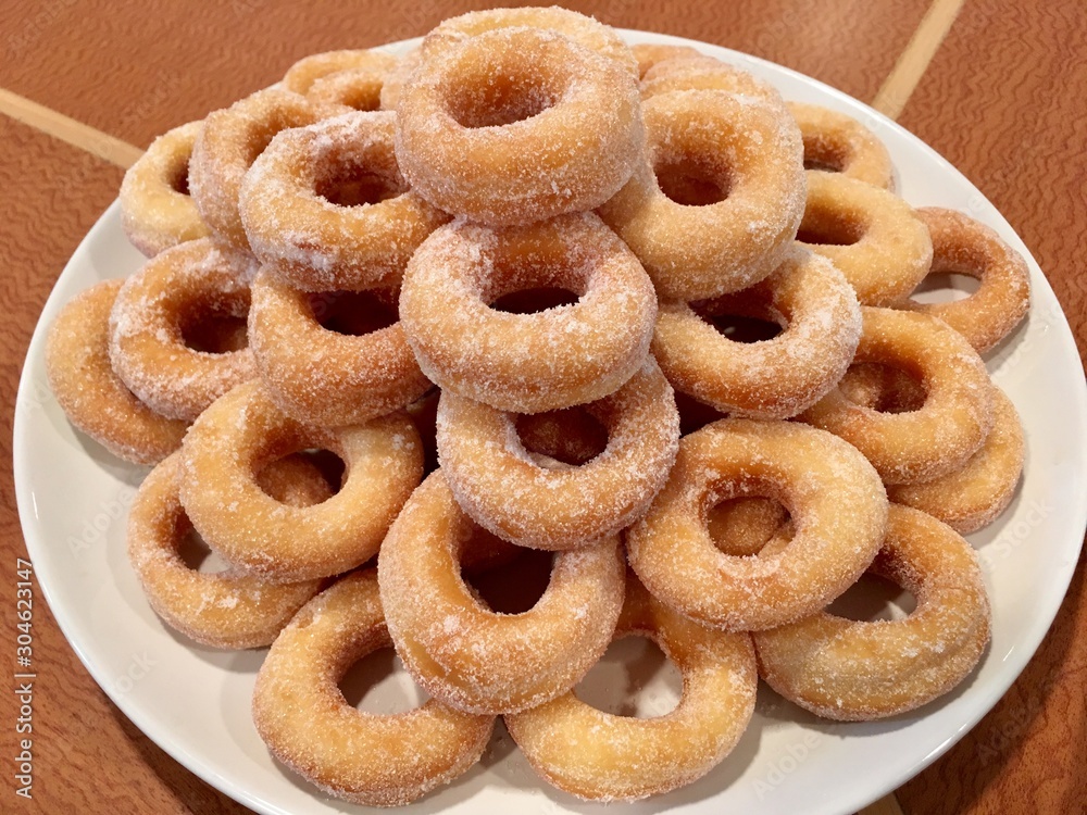 Doughnut topped with sugar icing delicious sweet light meal Doughnut topped with sugar icing delicious sweet light meal