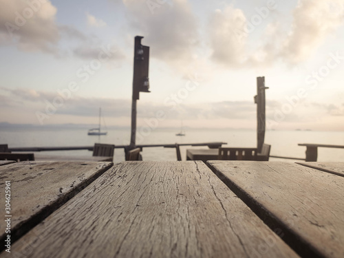 wooden table with a blurry background in the sea