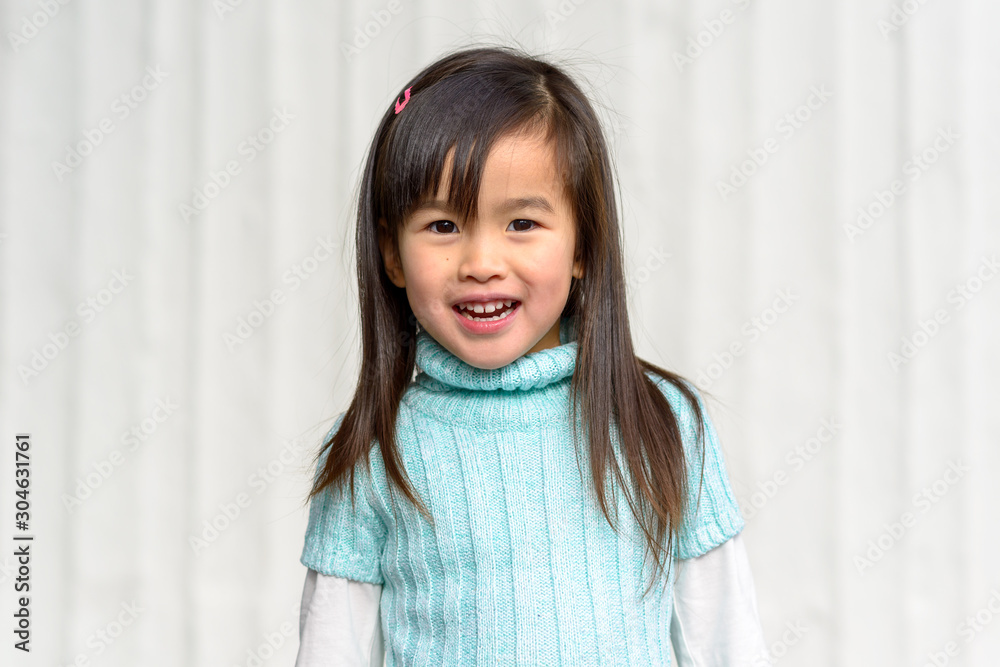 Attractive young girl looking happy at camera Attractive young girl looking happy at camera