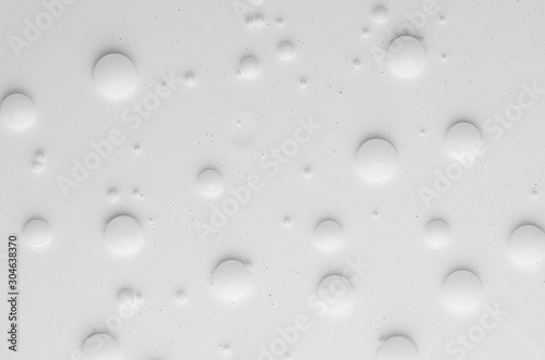 White liquid paint bubbles texture as abstract background.