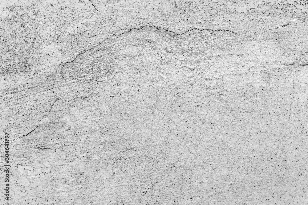 Obraz premium Texture of a concrete wall with cracks and scratches which can be used as a background