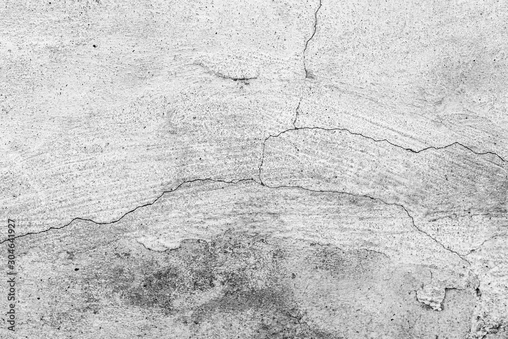 Obraz premium Texture of a concrete wall with cracks and scratches which can be used as a background