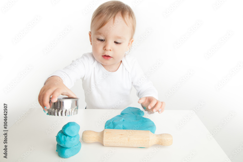 Using cookie cutter and play dough Using cookie cutter and play dough