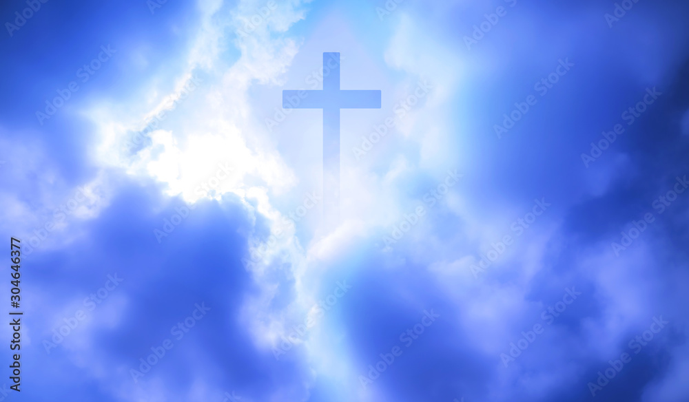 Christian cross appeared bright in the sky with soft fluffy clouds, white, beautiful colors. With the light shining as hope, love and freedom in the sky background Christian cross appeared bright in the sky with soft fluffy clouds, white, beautiful colors. With the light shining as hope, love and freedom in the sky background
