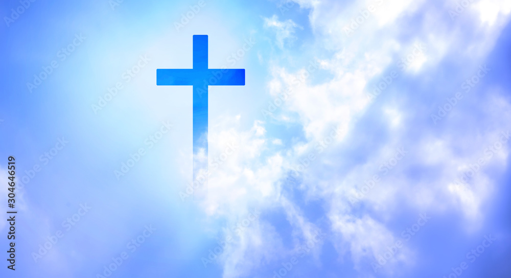 Christian cross appeared bright in the sky with soft fluffy clouds, white, beautiful colors. With the light shining as hope, love and freedom in the sky background Christian cross appeared bright in the sky with soft fluffy clouds, white, beautiful colors. With the light shining as hope, love and freedom in the sky background