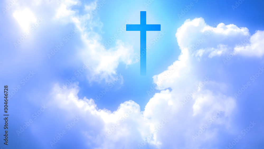 Christian cross appeared bright in the sky with soft fluffy clouds, white, beautiful colors. With the light shining as hope, love and freedom in the sky background