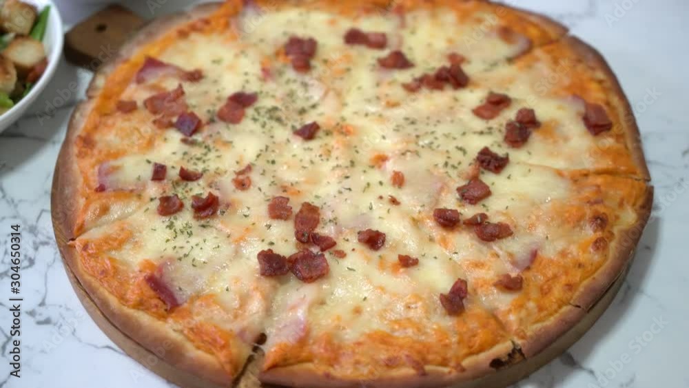 bacon and cheese pizza on wood board bacon and cheese pizza on wood board