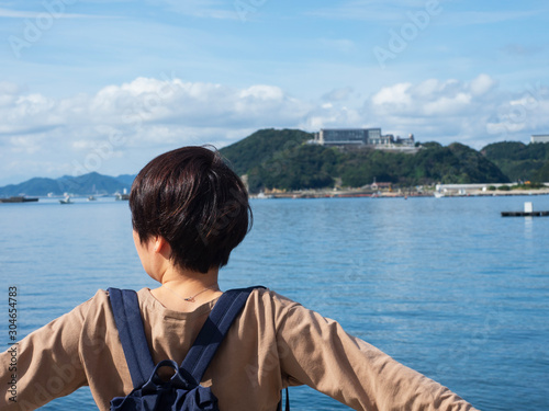 Japanese woman with sea view