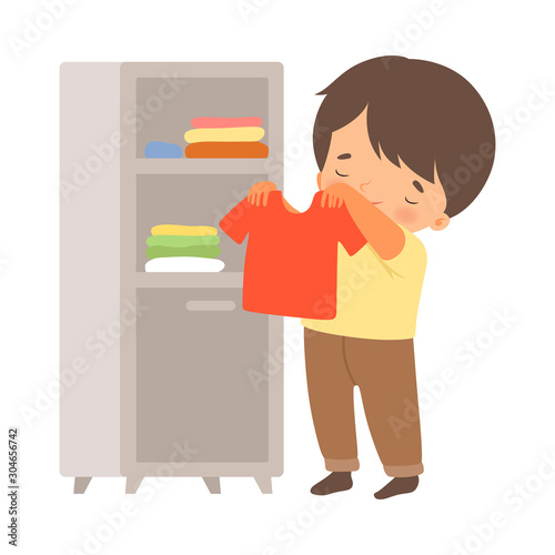 Little Boy Folding His Clothing in Wardrobe Vector Illustration