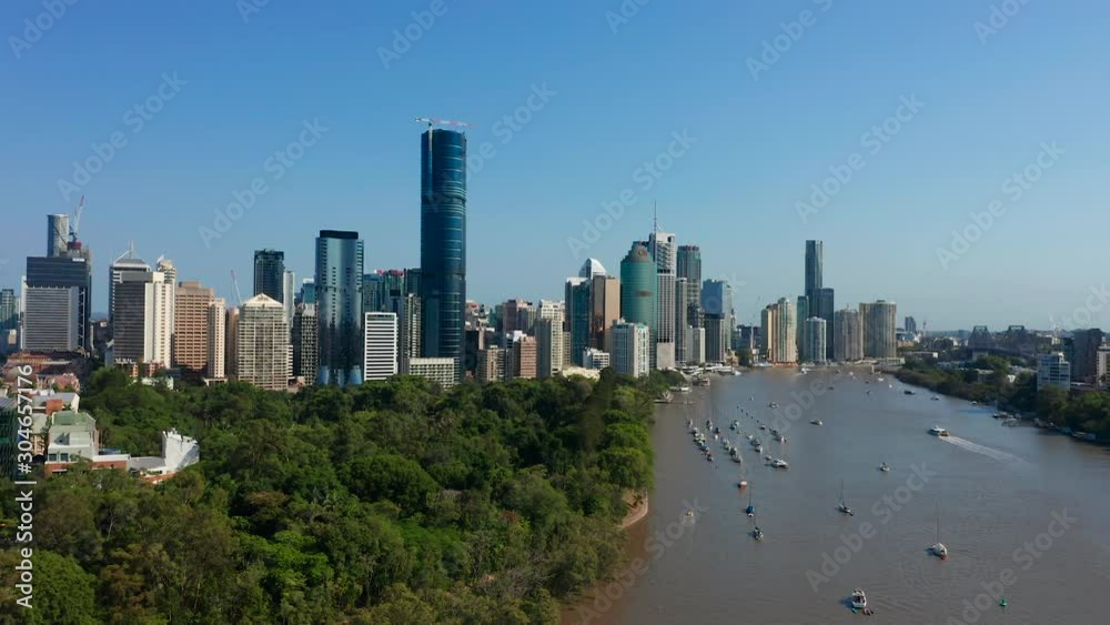 Boats Anchored next to Brisbane botanic gardens with city in the background. Brisbane Aerial Boats Anchored next to Brisbane botanic gardens with city in the background. Brisbane Aerial