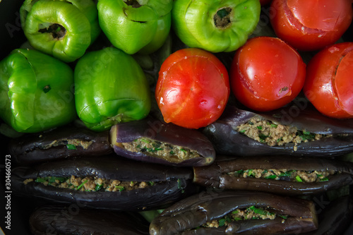 Eggplants are stuffed with meat lamb and rice. In Turkey, this dish is called Patlican dolmasi. eggplant filling . Stuffed eggplant in the boiler . photo