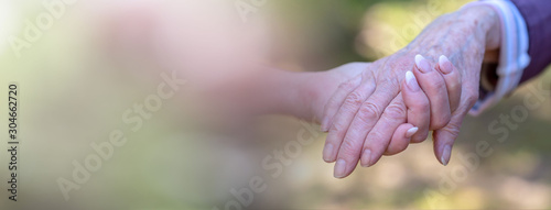 Concept of elderly support; panoramic banner