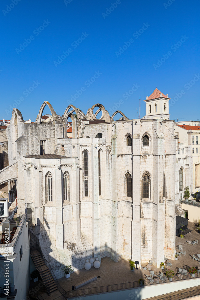 Ruins of the medieval Convento do Carmo (Carmo Convent) in Lisbon, Portugal, on a sunny day in the summer.