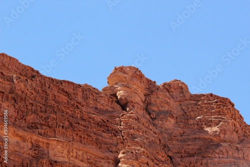 evocative wind-eroded mountains in the Wadi Rum desert © Bookaroo68