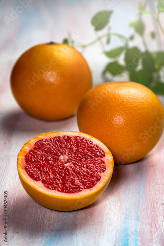 Bloody orange (Citrus sinensis) on a wooden table