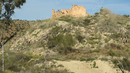 Ruin of house and olive orchard in Spain, Andalusia, dolly shot