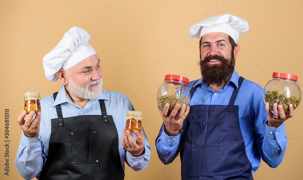 Cooking healthy. cheerful men hold food ingredients. prepare food. cuisine concept. healthy eating. professional cook. mature senior bearded men in kitchen. Chef men cooking Cooking healthy. cheerful men hold food ingredients. prepare food. cuisine concept. healthy eating. professional cook. mature senior bearded men in kitchen. Chef men cooking