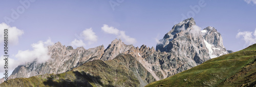 Panoramic view on Mount Ushba, Main Caucasian ridge. Zemo Svaneti, Georgia. Autumn landscape.