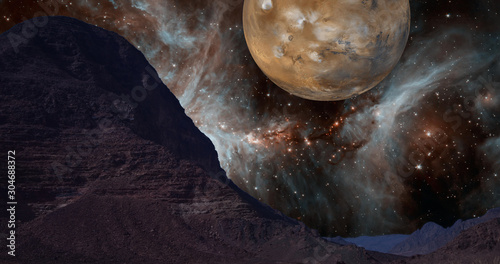 Фотография Composite image of the rocky desert in Jordan with unreal background of a star nebula and the planet Mars
