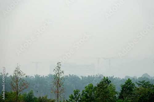 Photography Low visibility rural view with dangerous haze and fog in Kuala Lumpur,Malaysia