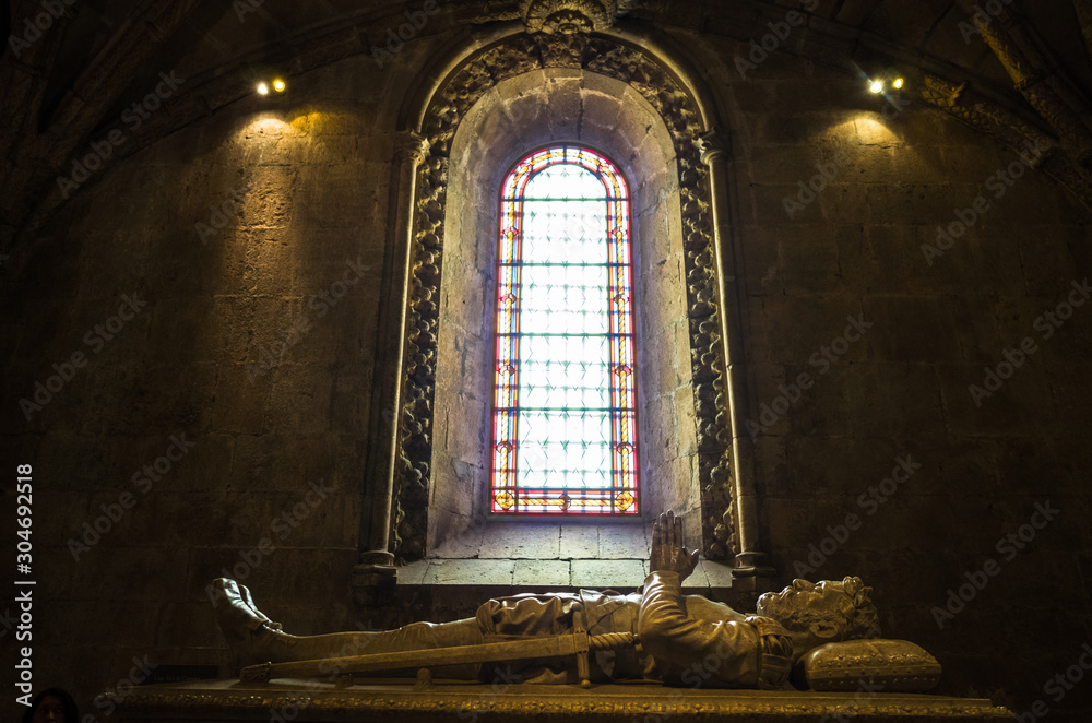 Lisbon, Portugal - July, 25th, 2018 : Tomb of navigator Vasco da Gama inside the Jeronimos Monastery, one of the most prominent examples of the Portuguese Late Gothic Manueline style.
