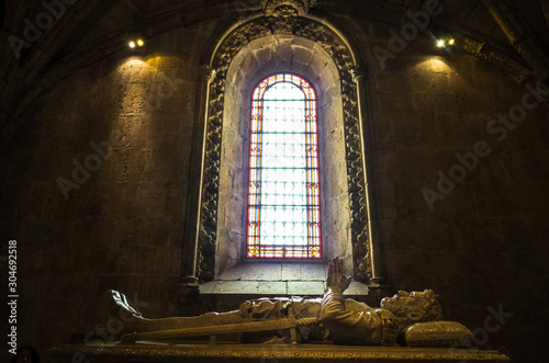 Lisbon, Portugal - July, 25th, 2018 : Tomb of navigator Vasco da Gama inside the Jeronimos Monastery, one of the most prominent examples of the Portuguese Late Gothic Manueline style.