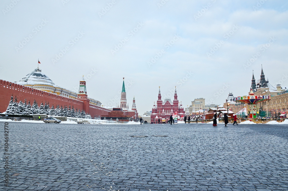 Moscow, Russia - February 8, 2018: Winter view of Red square, Moscow Kremlin, Historical Museum and GUM building Moscow, Russia - February 8, 2018: Winter view of Red square, Moscow Kremlin, Historical Museum and GUM building