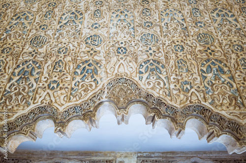 Granada, Spain - September 20th, 2019 : Close up of the decorations of the qubba main hall of the 13th century Cuarto Real de Santo Domingo - Royal Quarters of Santo Domingo - or Almanxarra palace.