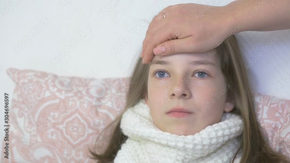 sick girl podatku measure the temperature, caring for children, sick colds and viral diseases sick girl podatku measure the temperature, caring for children, sick colds and viral diseases