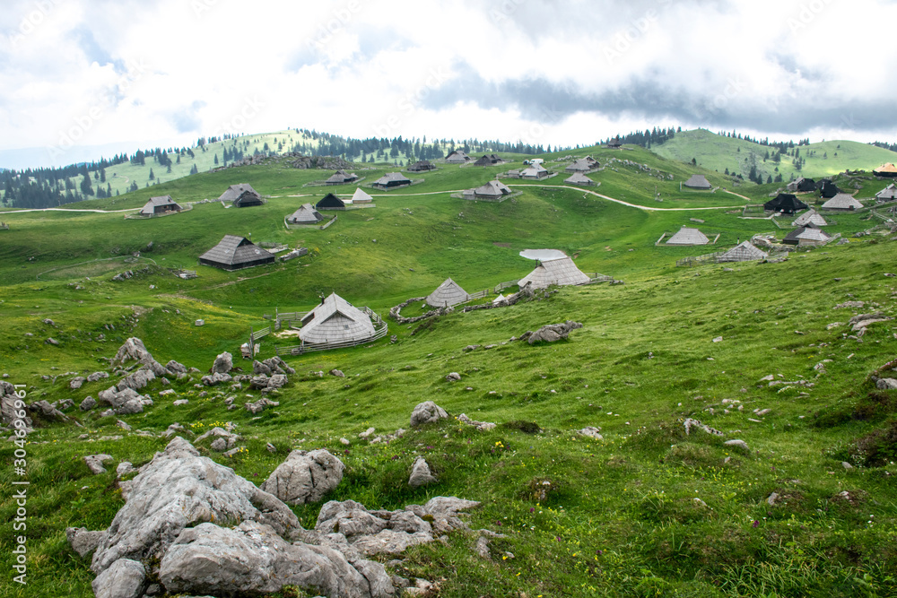Alpine huts in the Velika Planina plateau of Slovenia Alpine huts in the Velika Planina plateau of Slovenia