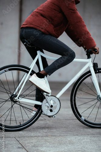 close-up of woman riding bike photo