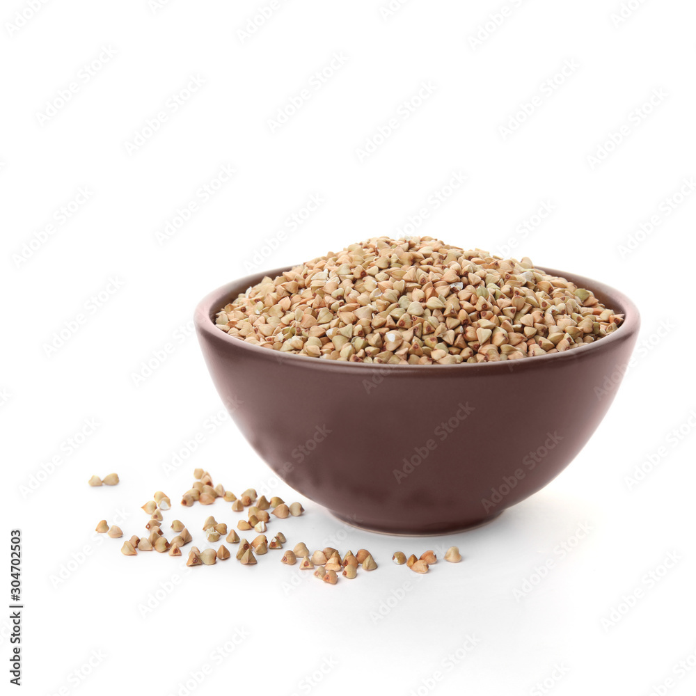 Organic green buckwheat in bowl isolated on white Organic green buckwheat in bowl isolated on white