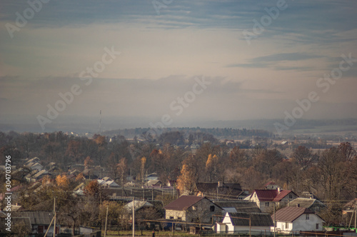 Village in the autumn afternoon in a haze