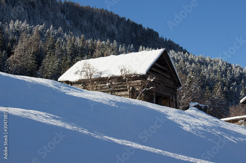 Snow-covered chalet in the Swiss Alps