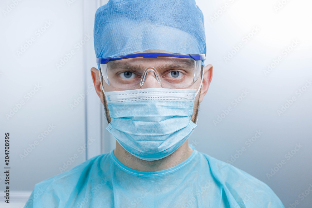 Portrait of a surgeon doctor in uniform at the medical office. Portrait of a surgeon doctor in uniform at the medical office.