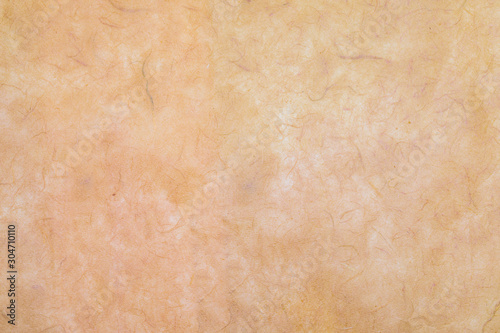 Paper texture (translucent) made by hand with visible organic fibers. In delicate shades, orange and vanilla.