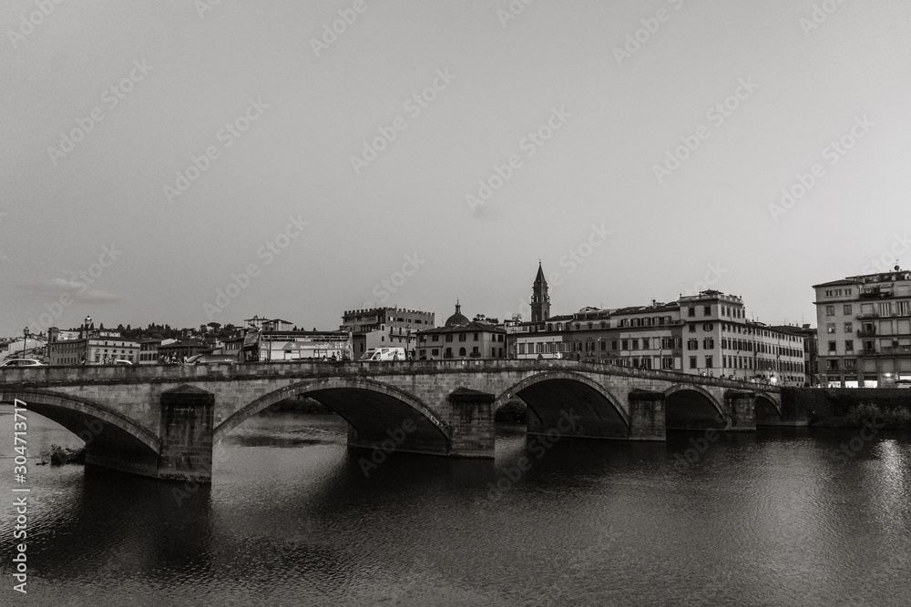 One of the famous bridges in Florence over the Arno river | FLORENCE, ITALY - 14 SEPTEMBER 2018.