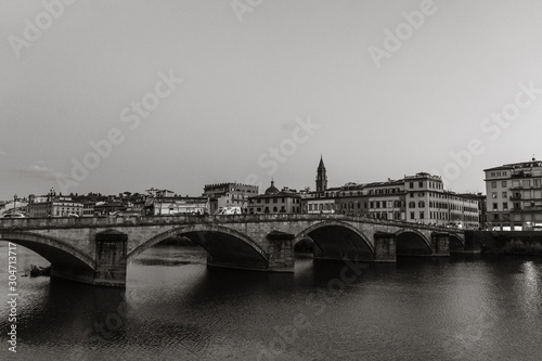 One of the famous bridges in Florence over the Arno river | FLORENCE, ITALY - 14 SEPTEMBER 2018.