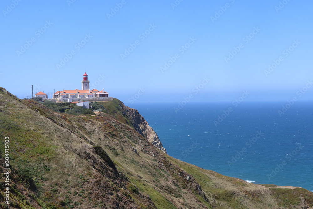 Sintra lighthouse on the rocky shore