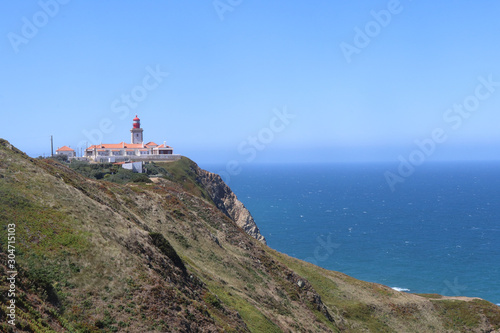 Obraz na płótnie Sintra lighthouse on the rocky shore w salonie
