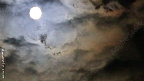 Moon and strange clouds in the night